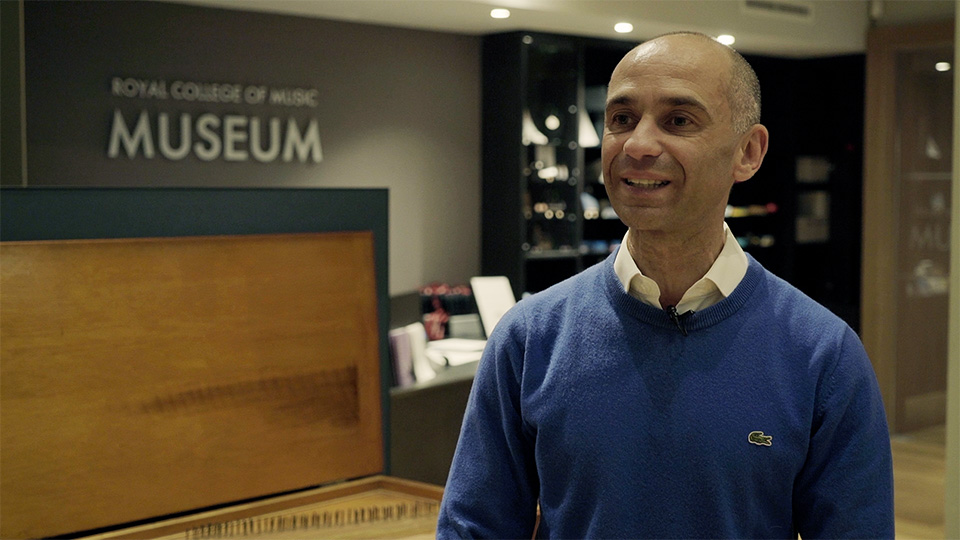 Professor Gabriele Rossi Rognoni, Curator of the RCM Museum, in front of the Museum reception
